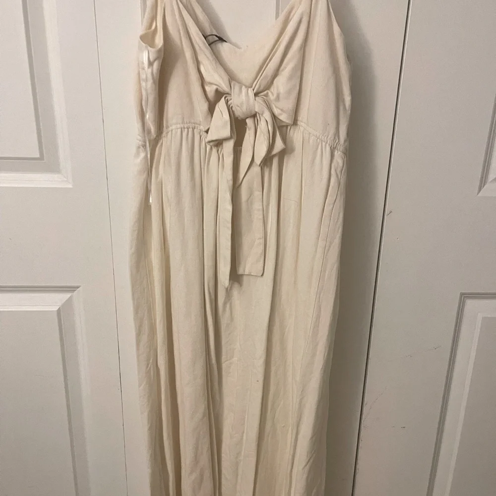 Zara off white midi dress. Spaghetti straps and has bow on the back. Size xl. - Picture 2 of 3